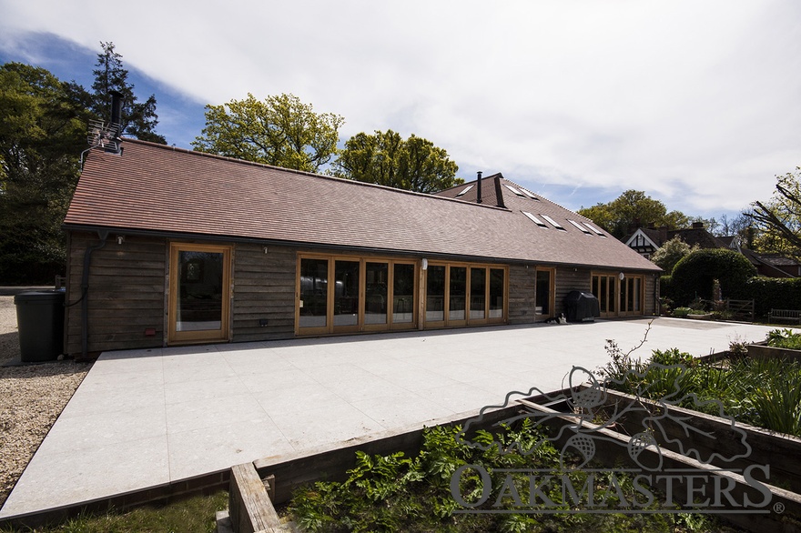 Back of the former stable complex is now full of bi-fold doors overlooking a vegetable garden
