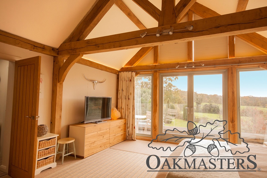 The master bedroom has a glazed gable and offer fabulous veiws