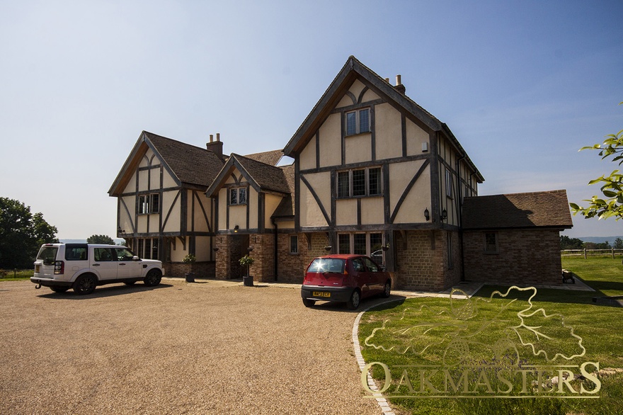 Front view of the oak manor house from the driveway