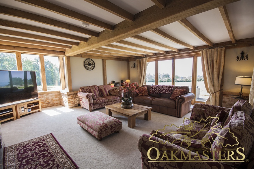 Heavy oak beam layout in a country manor house living room
