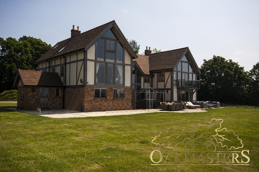 Rear of the oak framed house overlooks the countryside