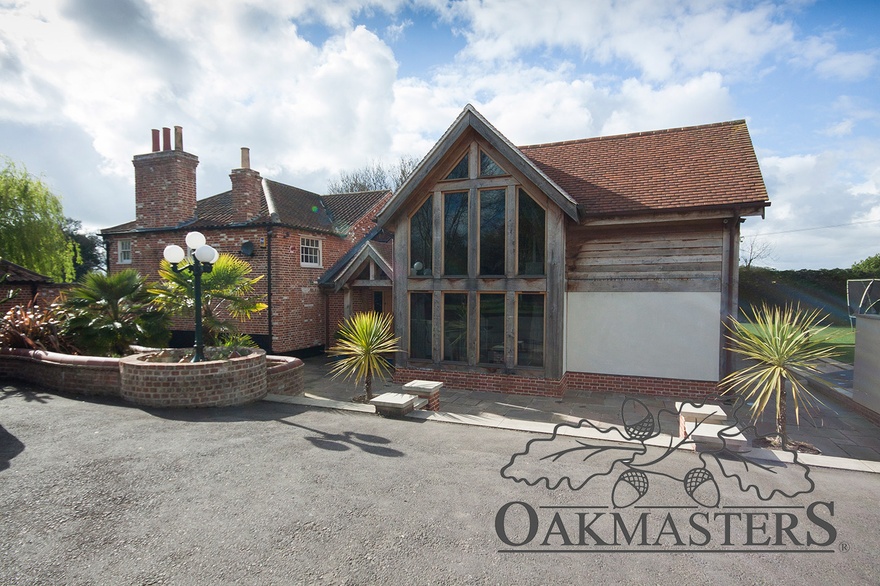 One oak glazed gable is at the front of the house