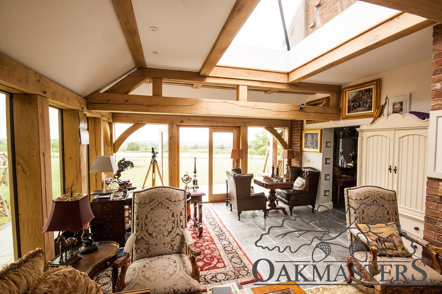 Oak framed orangeries feature half trusses and glass lanterns