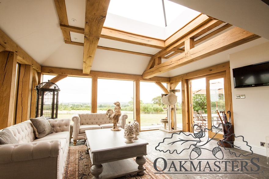 Two oak half trusses support a lantern on this oak framed extension