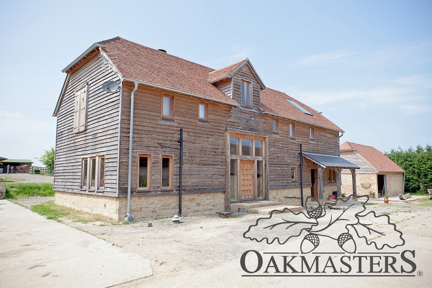 The front of the oak barn has smaller windows as it overlooks the neighbours