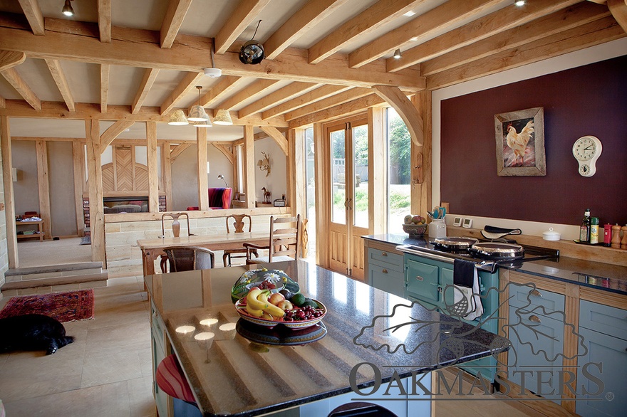 The dining corner of the kitchen opens up onto the fields behind the house
