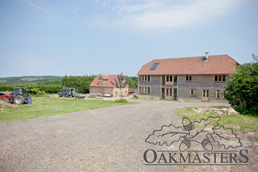 The owners are building a stone outbuilding adjacent to the main barn