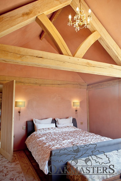 Floating oak trusses in the master bedroom