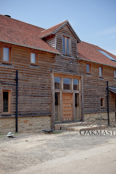 The front entrance door has an oak framed glazed surround