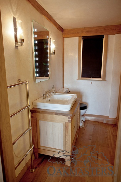 Visible oak frame detail in one of the en-suite bathrooms