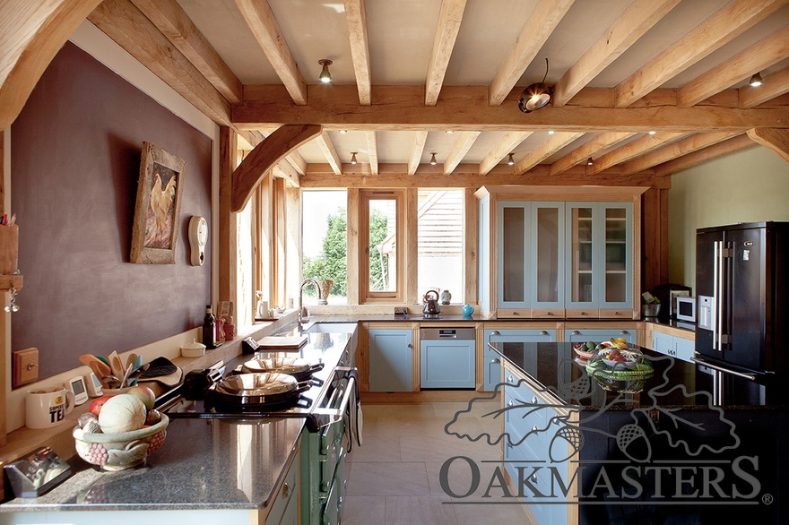 The oak ceiling gives the kitchen a genuine modern country feel
