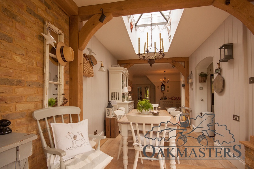 A glass lantern floods the dining table with natural light