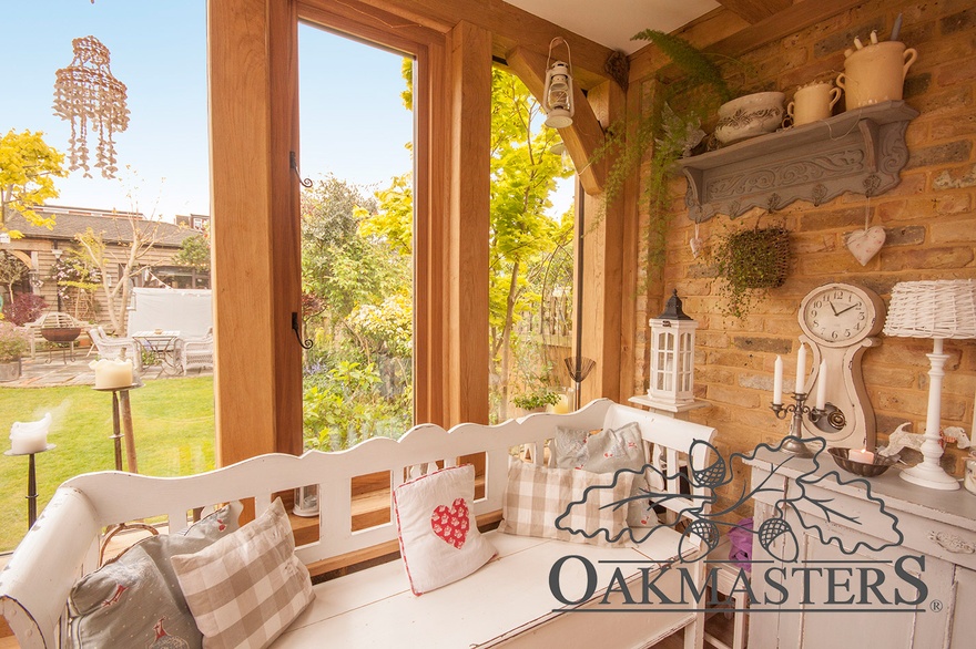 A glazed oak frame features a lovely single light window, which can be opened to let air in