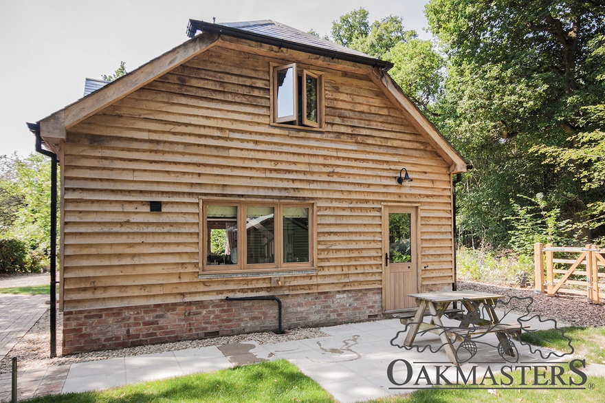 Utility exit from the kitchen opens onto a small patio.