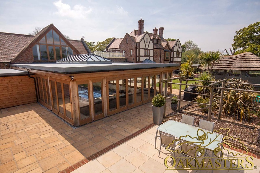 View of the oak pool building with flat roof from above