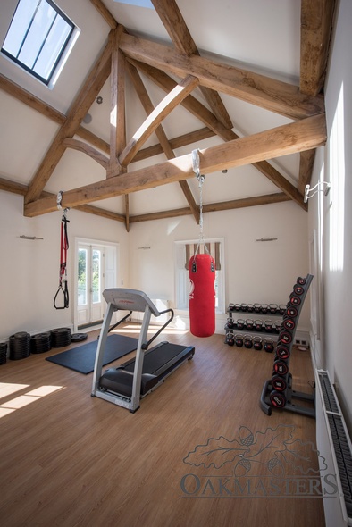 The gym room also features a vaulted oak ceiling