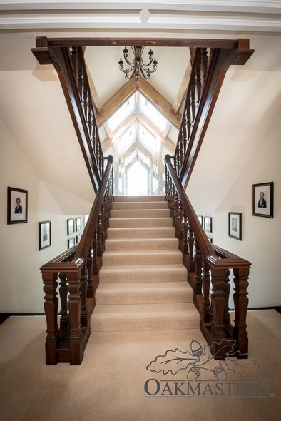 You can get a peek of the oak vaulted roof through the wooden staircase
