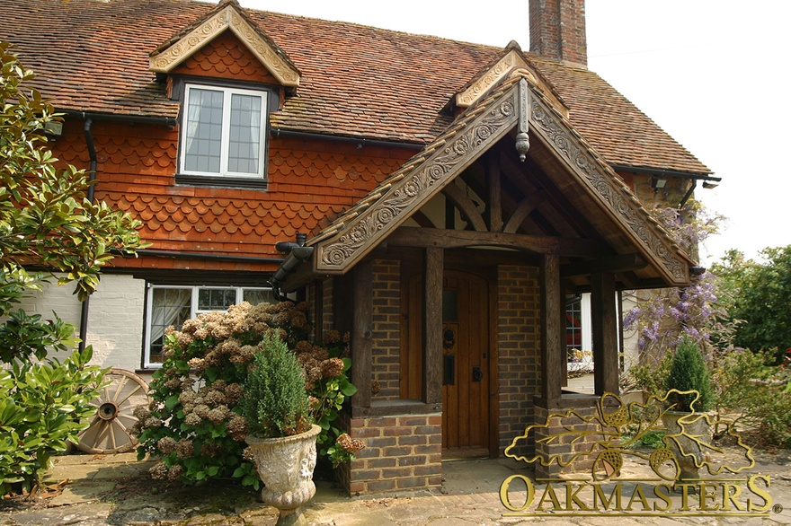 Oak porch with carved detail and sunken oak truss