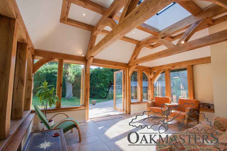 An oak orangery will allow you to enjoy the views, soak in the sun, but stay in the shade at the same time