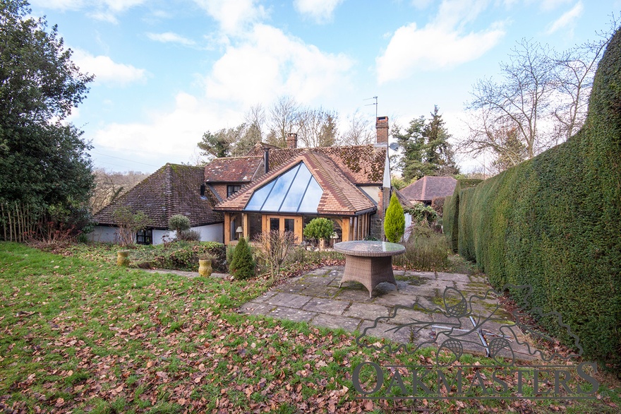 The oak garden room compliments the house rather than blending in