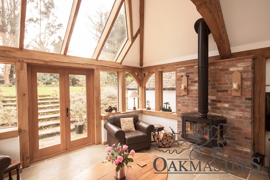 The light flooding through the oak frame makes this garden room