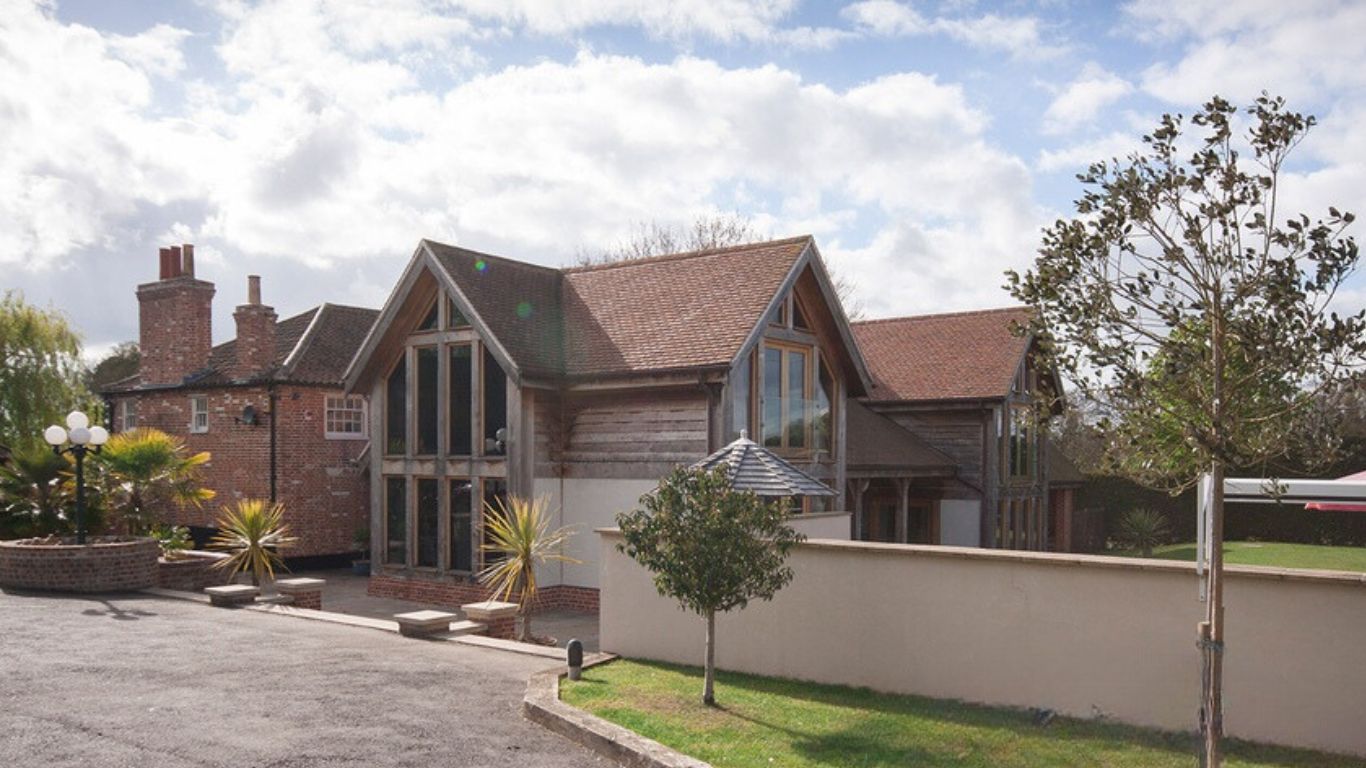 Double storey oak framed house extension adding luxurious space and charm to the country property