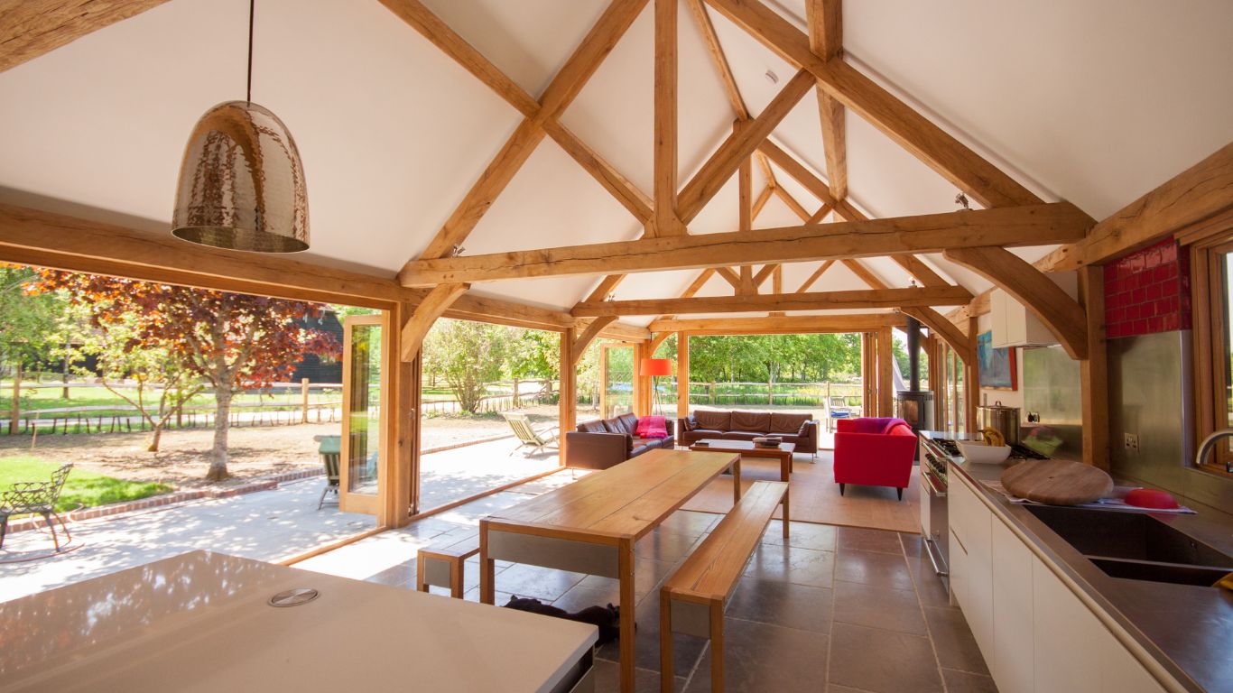 A large garden room made with an oak frame in a timeless design. This oak framed orangery provides a luxurious and inviting space.