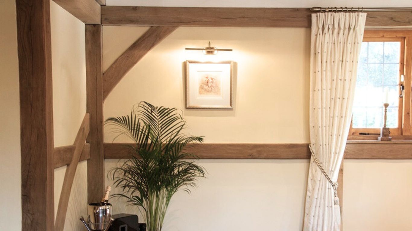 Enhancing the room's charm and character with cosmetic oak cladding on the walls.